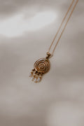 Volute with Pearl