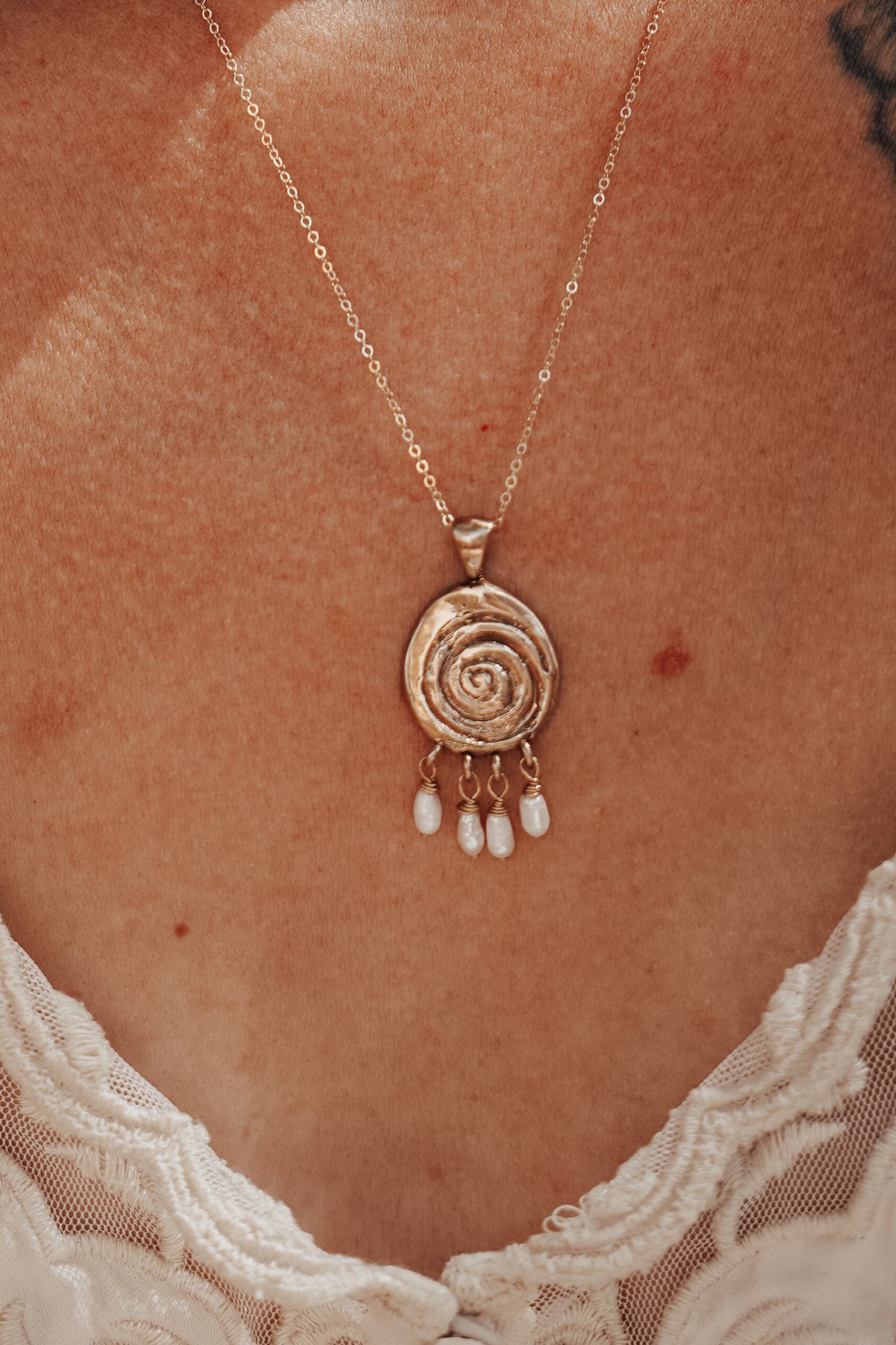Volute with Pearl